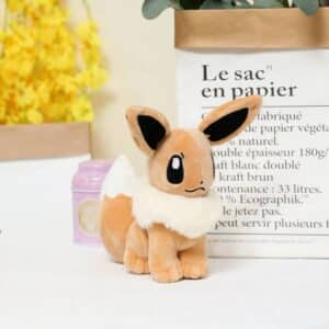 Pokémon Evoli plush. The plush is brown and has a large white fur on its neck. Evoli has large pointed ears.