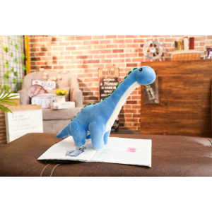 Blue dinosaur plush in a living room on a table