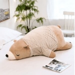 Sleeping brown teddy bear with clothes on Magic Plush
