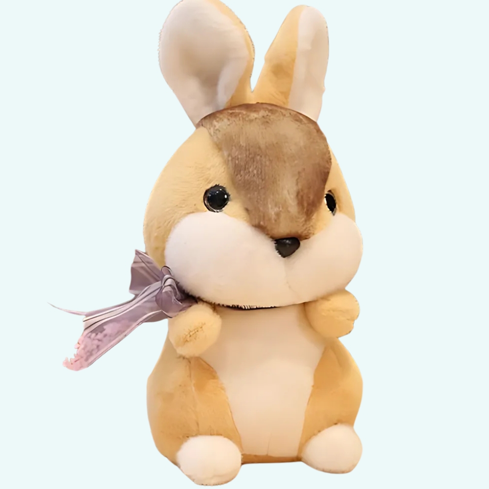 Beige rabbit plush on a light blue background.