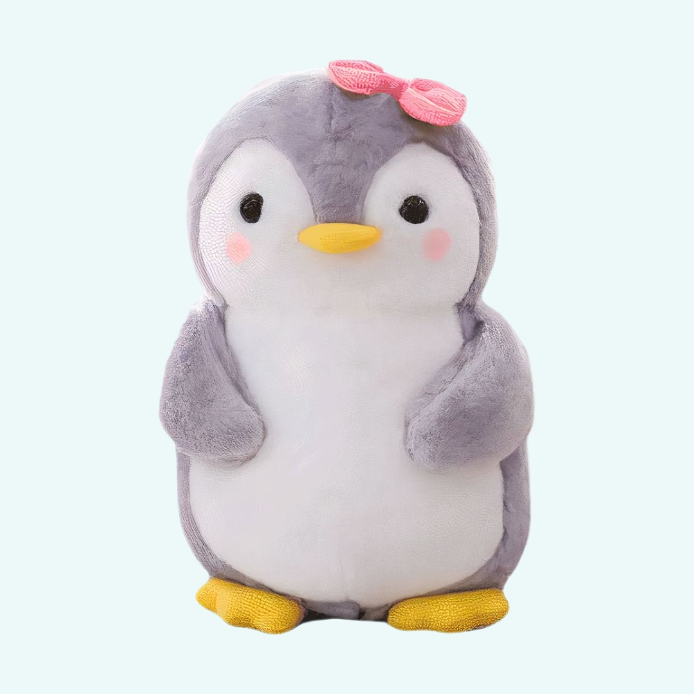 Pink penguin plush bow on a light blue background.