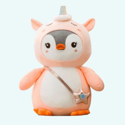 Pink penguin plush with unicorn costume on a light blue background.