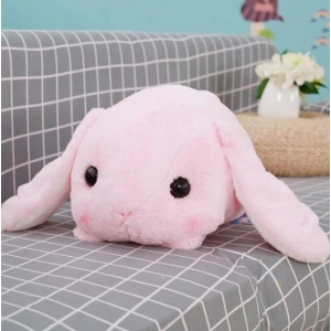 Pink plush rabbit lying down Plush Rabbit Animal Materials: Cotton