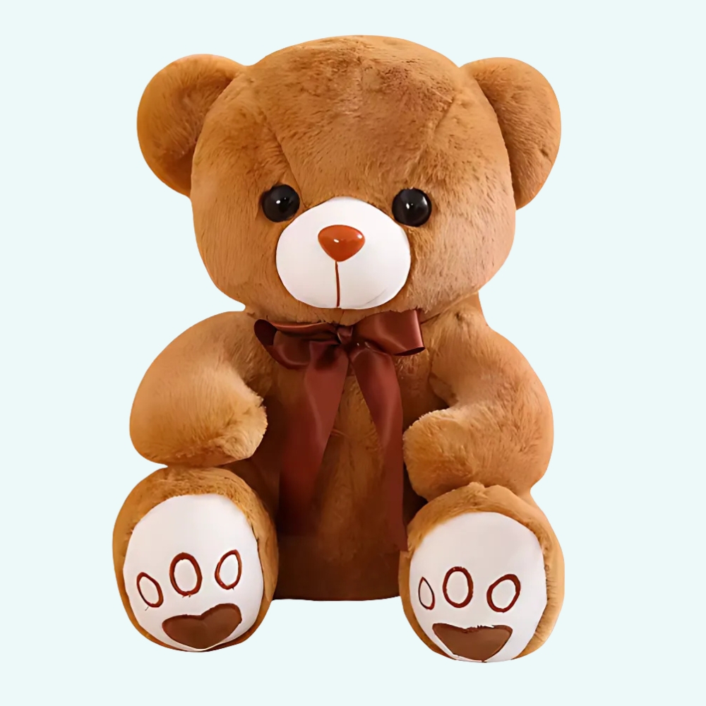 Brown teddy bear to chew on on a light blue background.