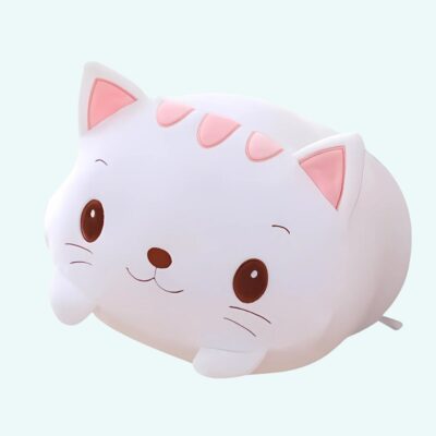 White cat plush pillow on a light blue background.