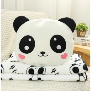 Loving panda plush with blanket in a sofa