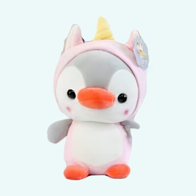 Penguin plush dressed as a unicorn on a light blue background.