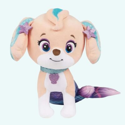 Super cute Coral Paw Patrol plush half dog half mermaid on plain background.