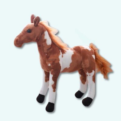 Brown plush horse on a light blue background.