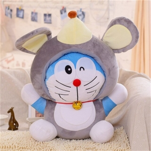 Doraemon plush dressed as a mouse sitting in a beige sofa