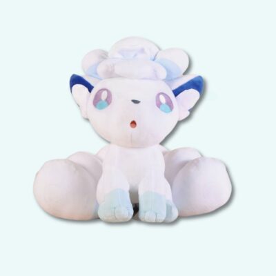 Pokemon goupix white plush from the alola family on a light blue background.