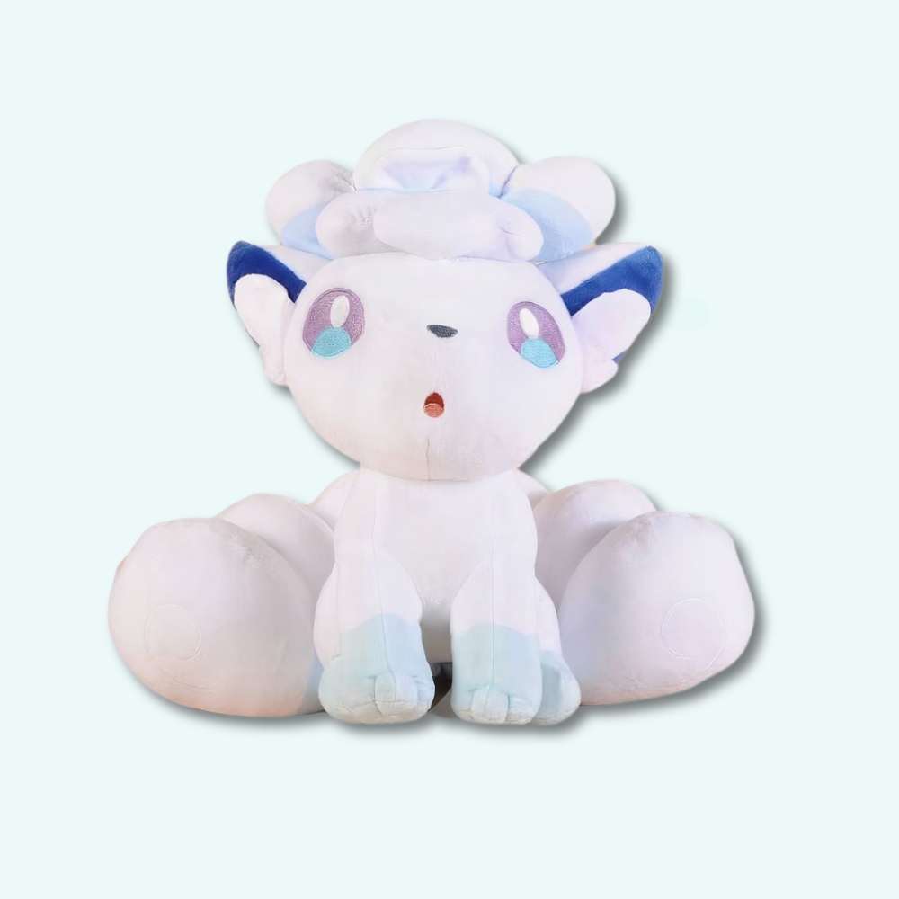 Pokemon goupix white plush from the alola family on a light blue background.