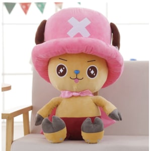 Giant pink Chopper One Piece plush sitting in a sofa