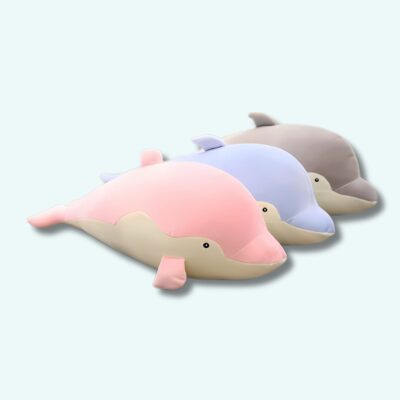 Dolphin plush for bedroom decoration pink, blue and grey on a light blue background.
