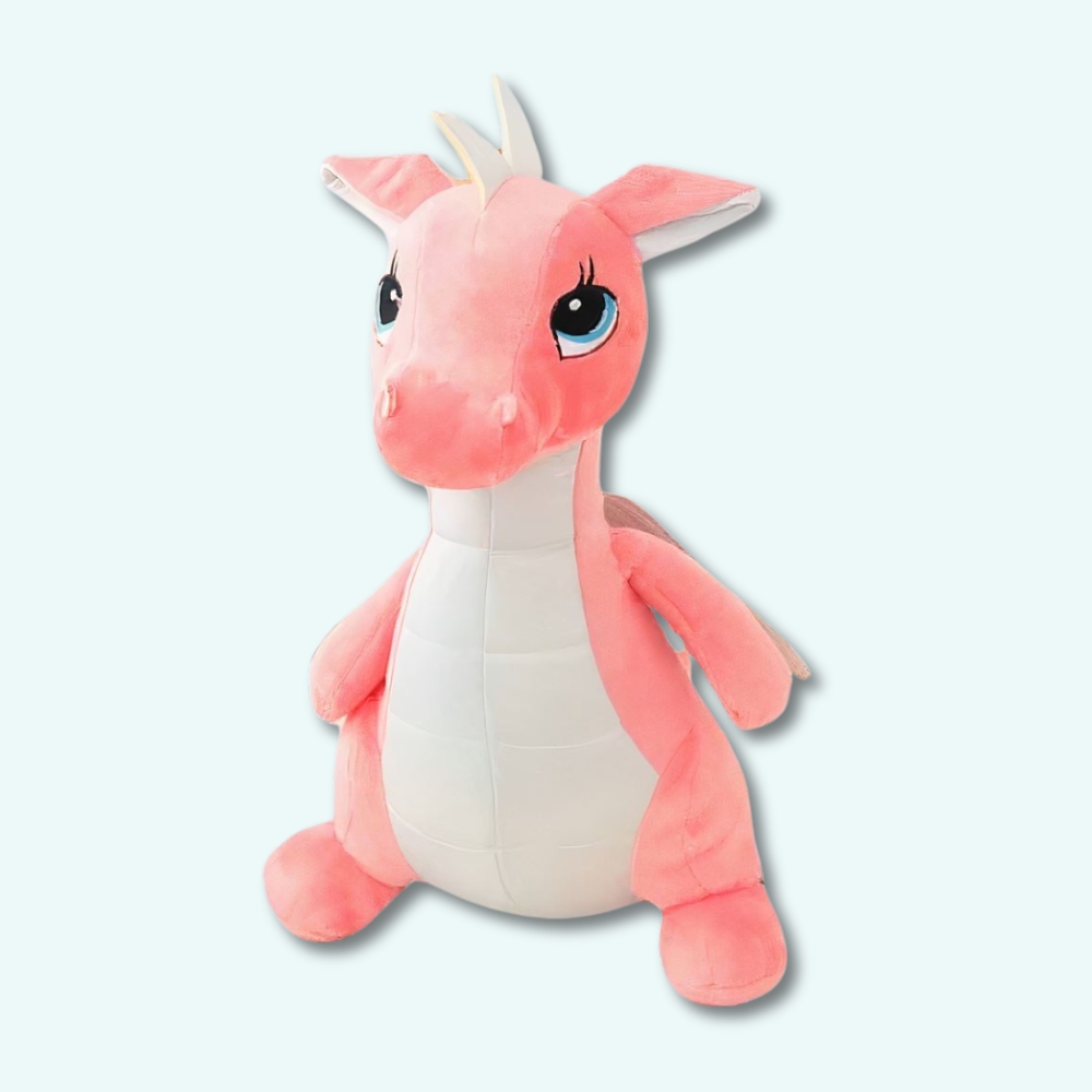 Cute pink dragon plush on a light blue background.