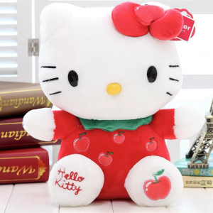 Cute Hello Kitty plush with red butterfly sitting in front of books