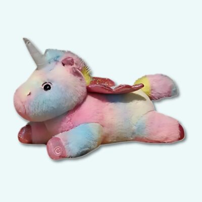 Multicoloured luminous unicorn plush for children on light blue background.