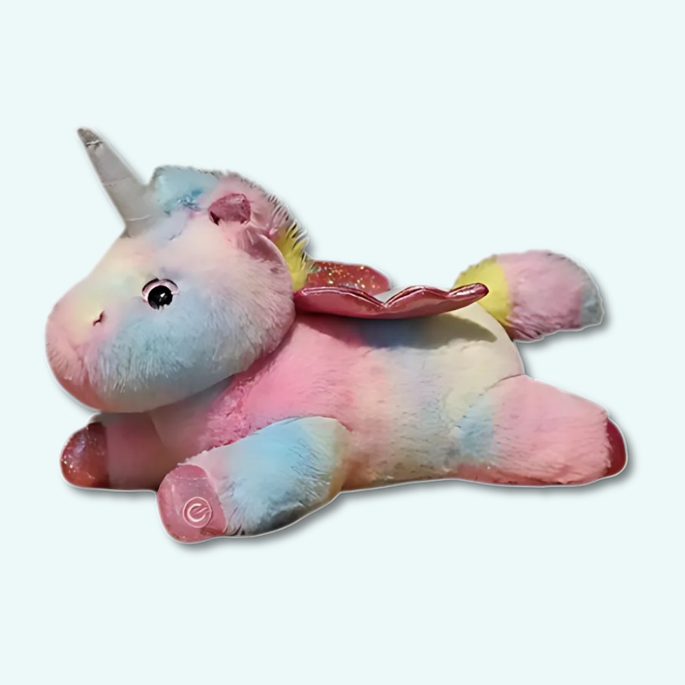 Multicoloured luminous unicorn plush for children on light blue background.