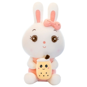 Bubble tea plush in the shape of a white and pink rabbit with a small soda in his hands in beige