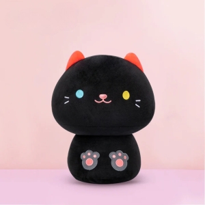 Cute animal cushion with black cat on pink background