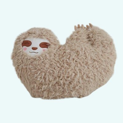 Heart-shaped sloth plush cushion for children on a light blue background.