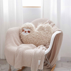 Heart-shaped sloth plush cushion for children
