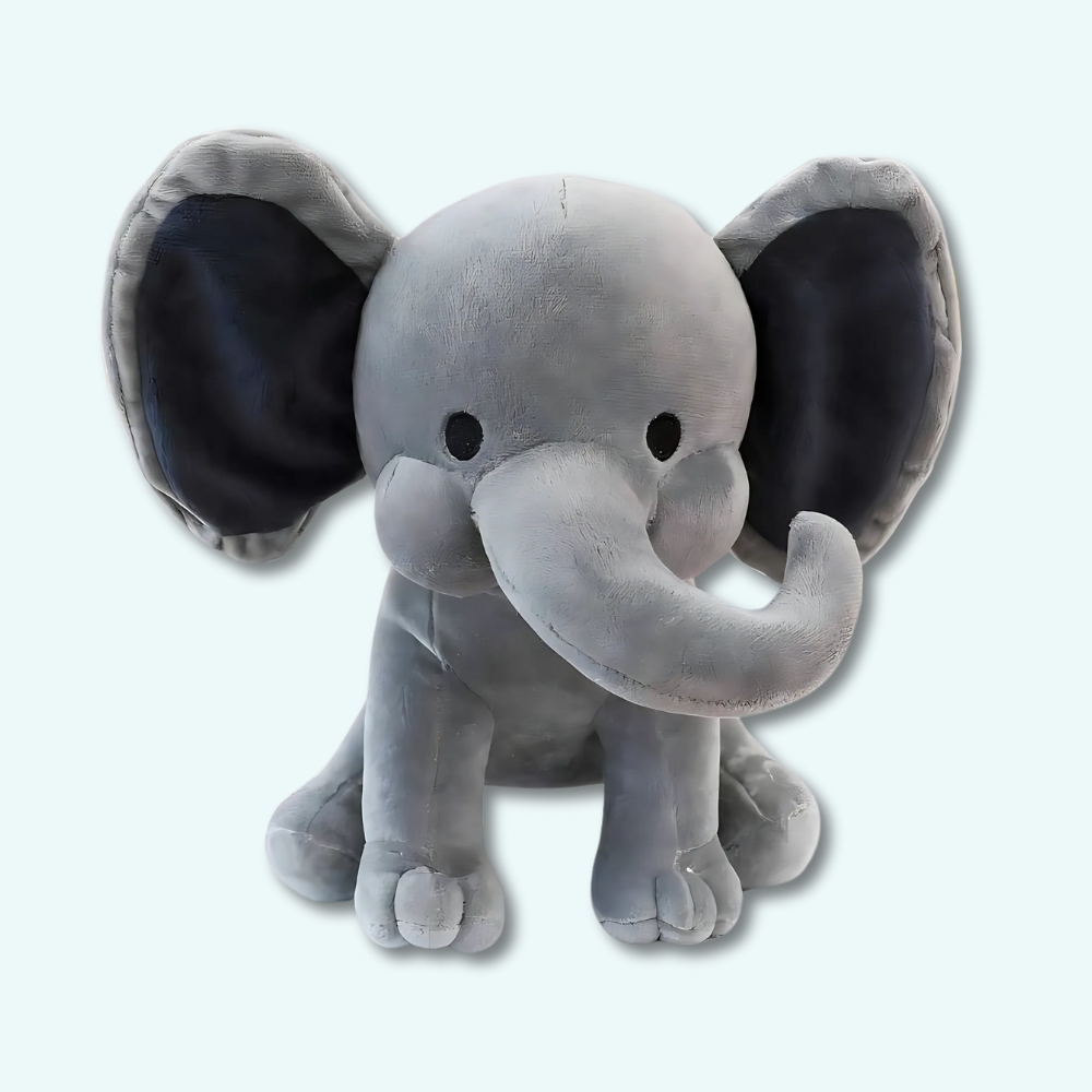 Grey elephant plush on light blue background.