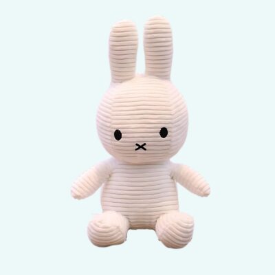 Miffy plush ribbed white on a light blue background.
