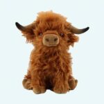 Brown long-haired Highland cow plush with large horns.