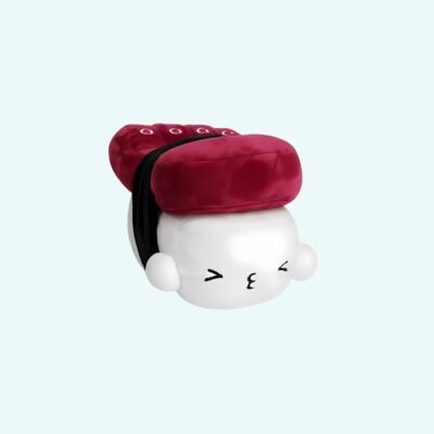 Pillow plush shaped like a squid sushi, in Kawaii style. The white base represents rice with a smiling, expressive face, topped with a burgundy piece mimicking squid. A black fabric band suggests the seaweed wrapping the whole piece.