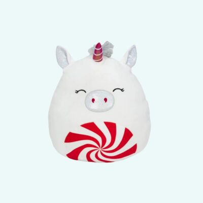 Soft Squishmallow plush shaped like a white unicorn with glittery ears, a multicolored horn, and a smiling face. On its belly, a red and white spiral candy design adds a festive and joyful touch.