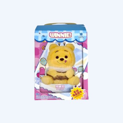 Pink and blue cardboard box with a Winnie the Pooh plush behind a clear plastic window. Set against a neutral background.