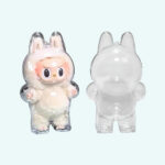 Protective case for standing Labubu-style plush toy, empty on the right and with a white plush inside on the left. On light blue background.