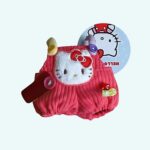 Kawaii overalls for Labubu plush in red corduroy with Hello Kitty head, on light blue background