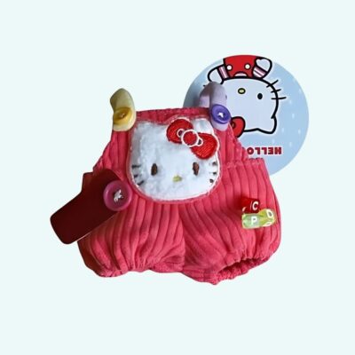 Kawaii overalls for Labubu plush in red corduroy with Hello Kitty head, on light blue background