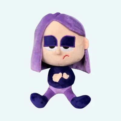 Duolingo plush Lily sitting with a disenchanted expression, soft purple hair and pants, knowing eyes. A perfect companion for kids’ daily language routines.