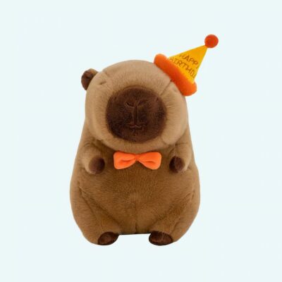 Birthday capybara plush with a festive hat on a white background