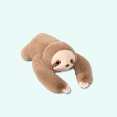 Weighted sloth plush with soft beige fur lying on a blue background.