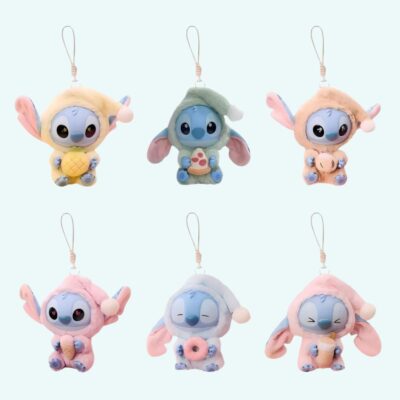 Six Stitch keychain plushies in kawaii style Labubu fashion in various pastel colours on sky blue background